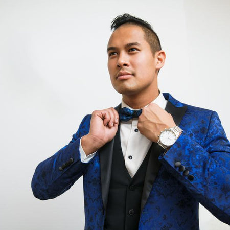 Man wearing blue silk tuxedo